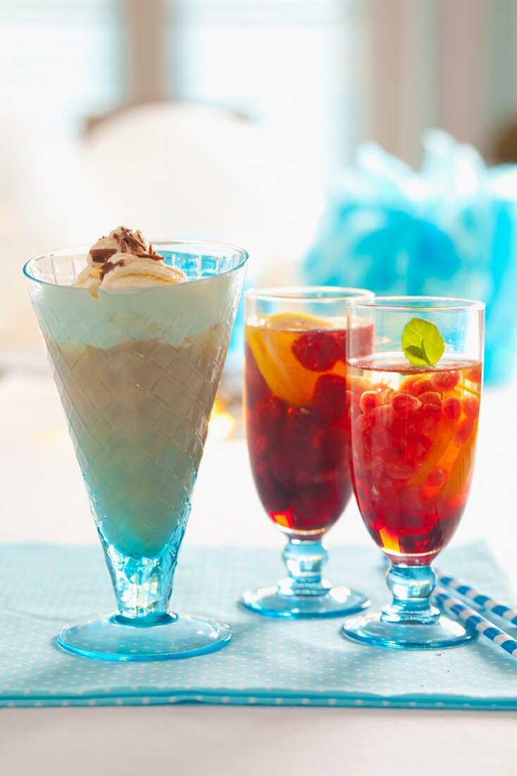 Assorted summer drinks: a chocolate milkshake, raspberry and lemon iced tea, pomegranate iced tea with lemon