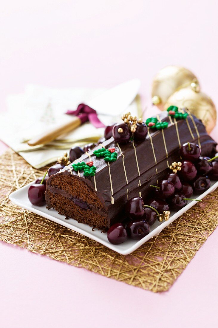 Rehrücken (cake designed to look like a saddle of venison), garnished with cherries for Christmas