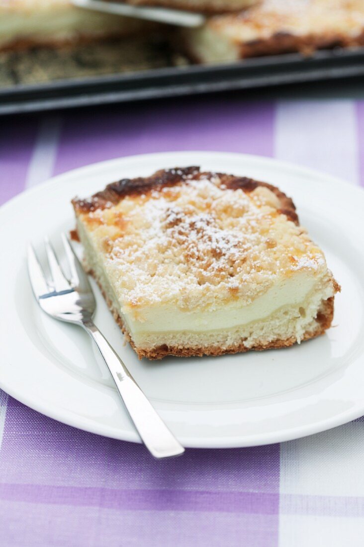 Tray-baked cheesecake with buttery crumble topping