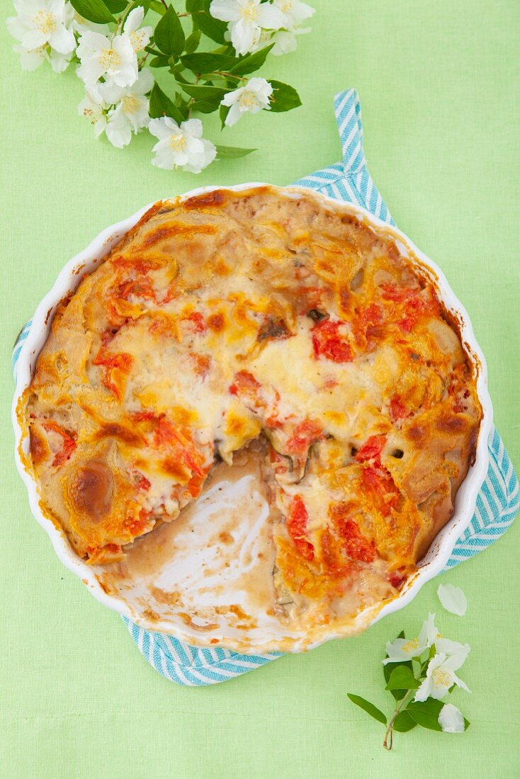 Courgette tart with aubergines, tomatoes and béchamel sauce