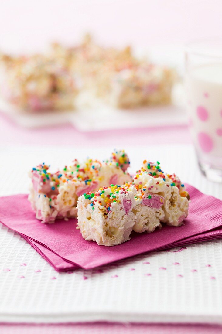White chocolate and popcorn slices with colourful sugar sprinkles