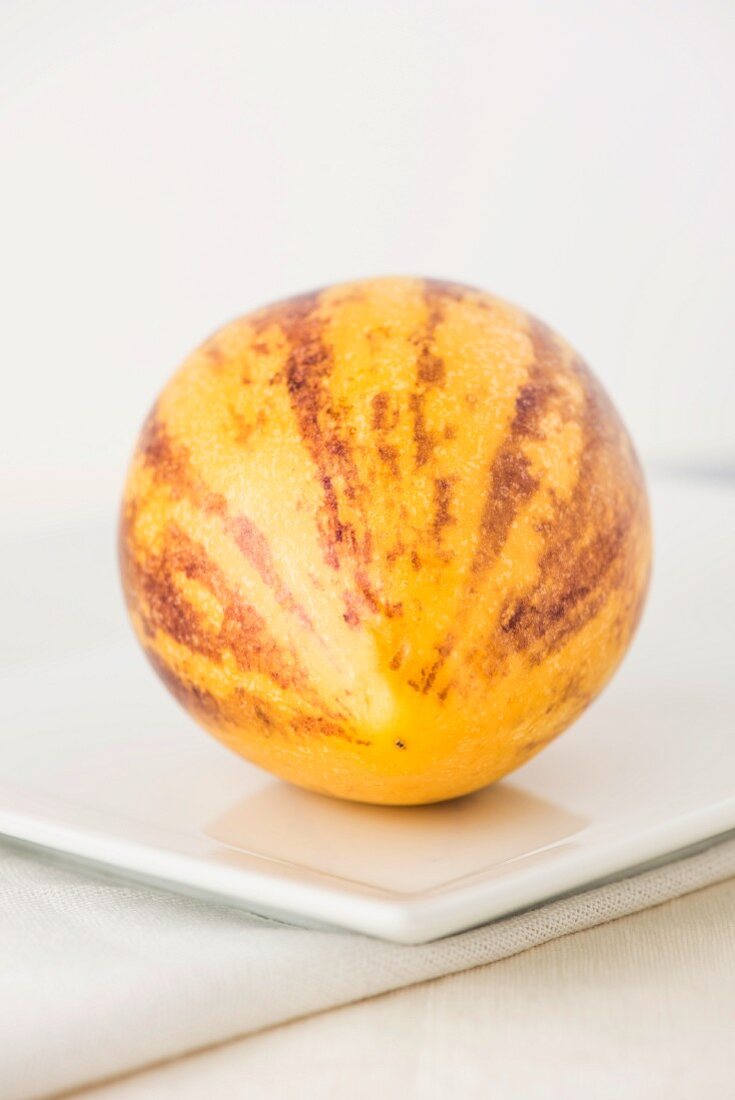 A Pepino melon on a plate