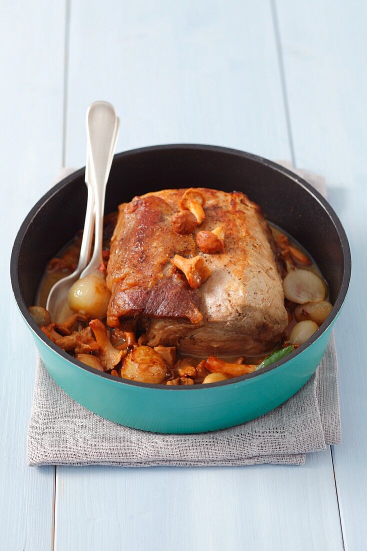 Pork loin braised with shallots and chanterelles