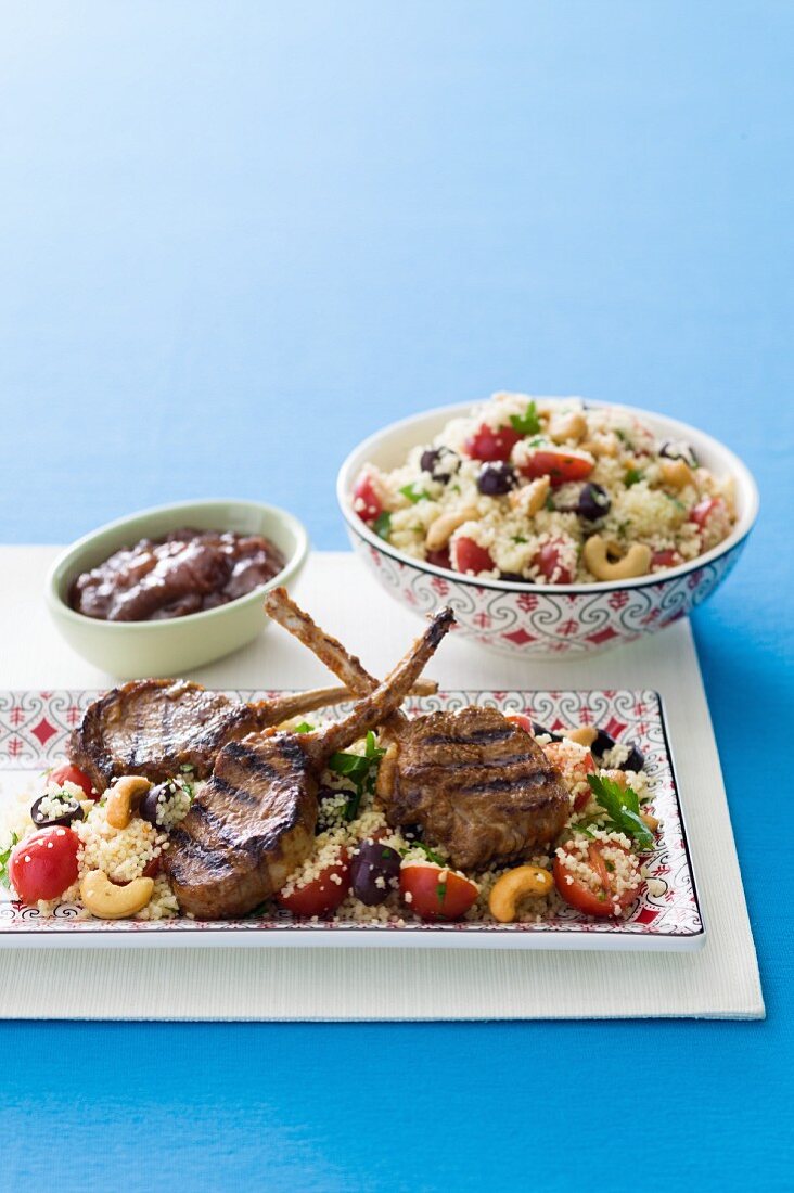 Grilled lamb chops on a bed of couscous salad