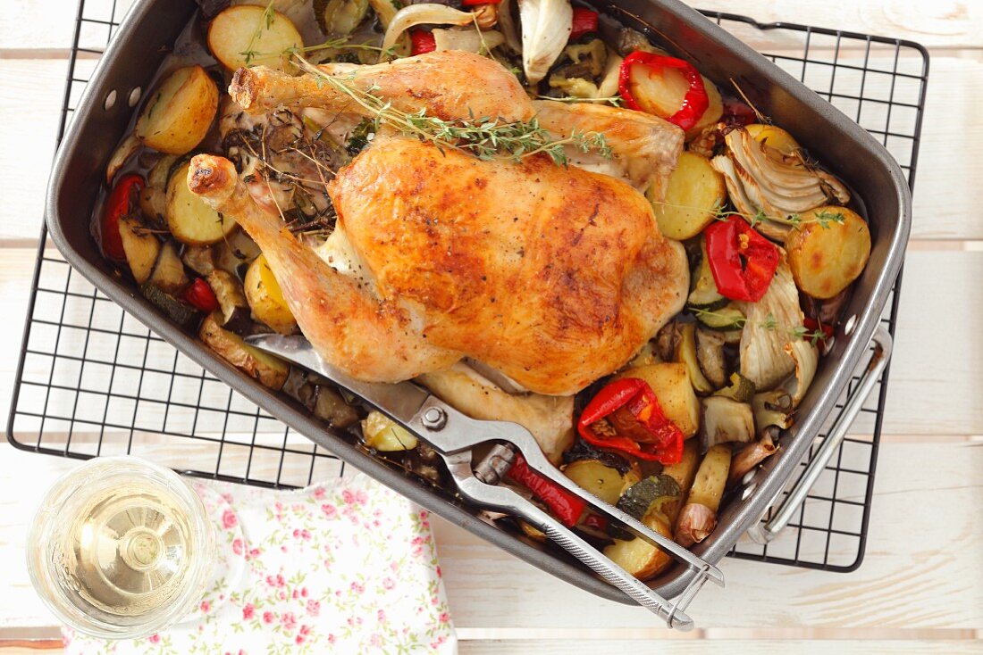 Thyme chicken on a bed of vegetables