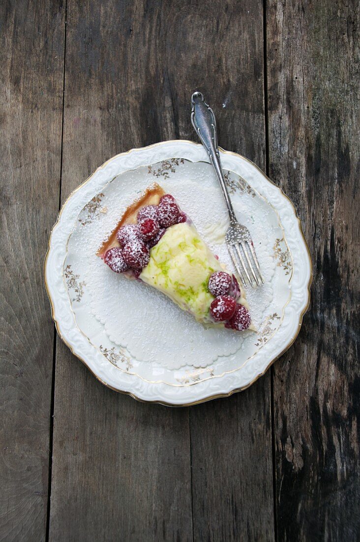 A slice of raspberry tart with lime mousse