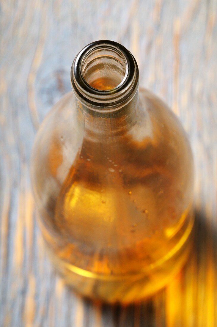 A bottle of white wine, opened