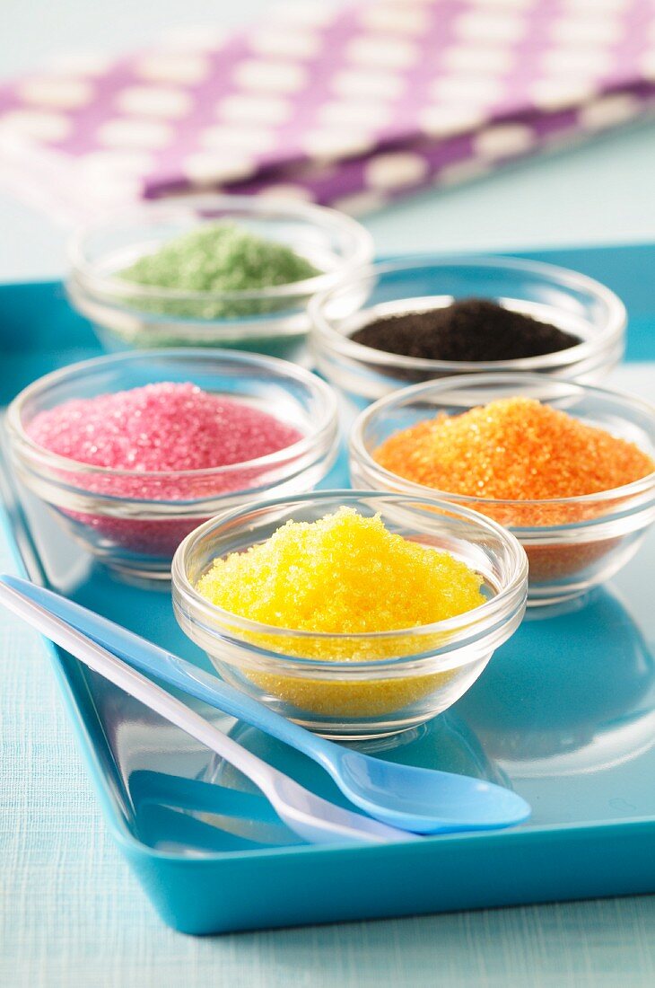 Colourful sugar in glass dishes