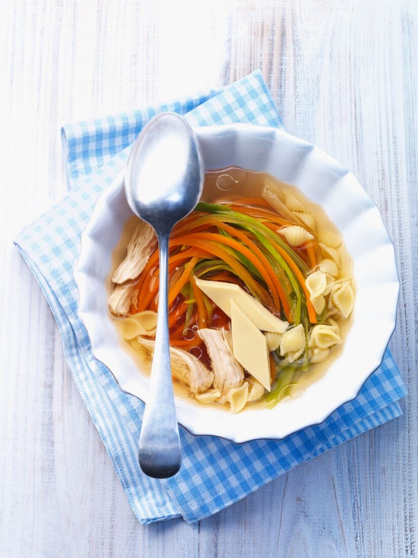 Chicken Noodle Soup in a Glass Bowl