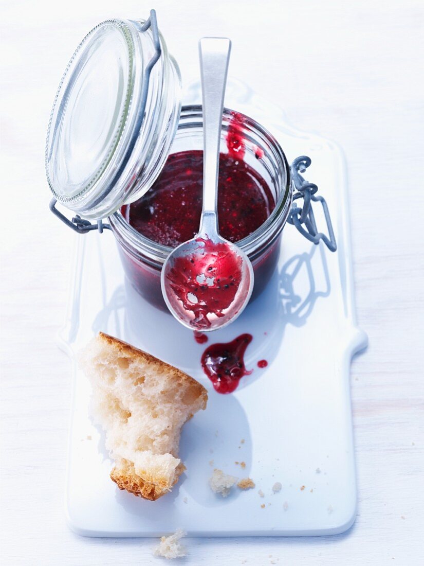 Berry fruit jam and a slice of bread
