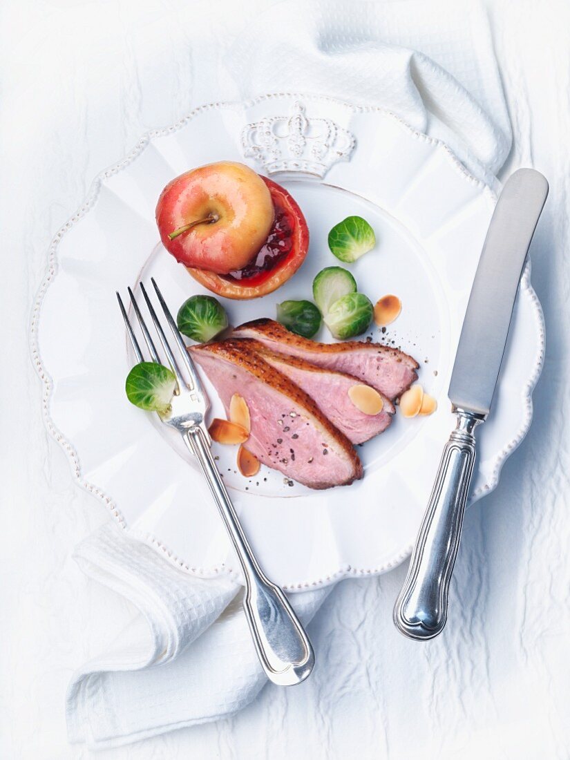 Duck breast with Brussels sprouts and a baked apple