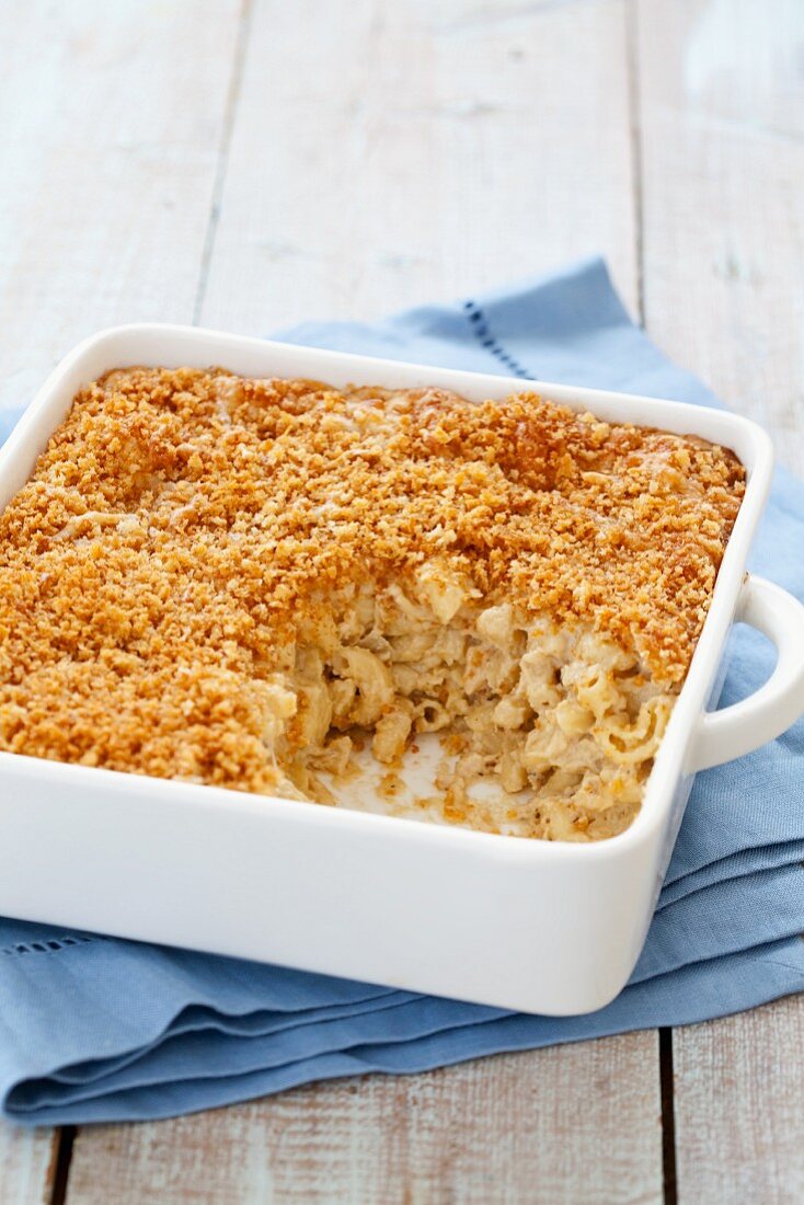 Southern Style Mac and Cheese in a Baking Dish with a Scoop Removed