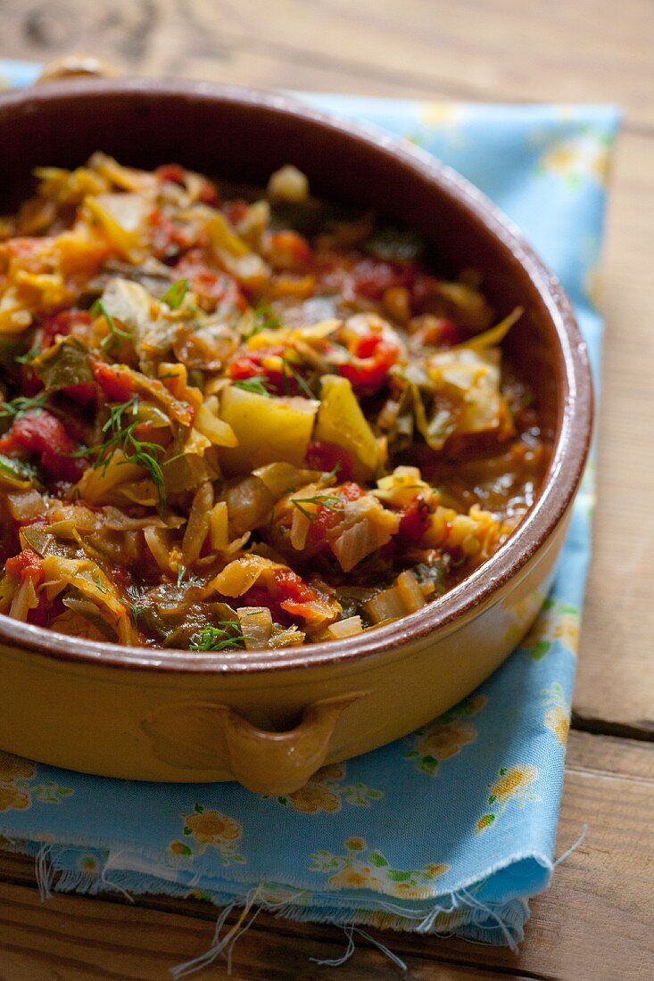 Bigos (sauerkraut casserole with meat, onions, tomatoes, Poland)