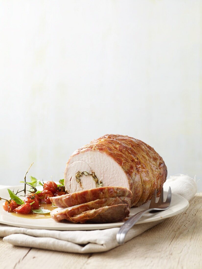 Veal roulade with tomatoes, sliced