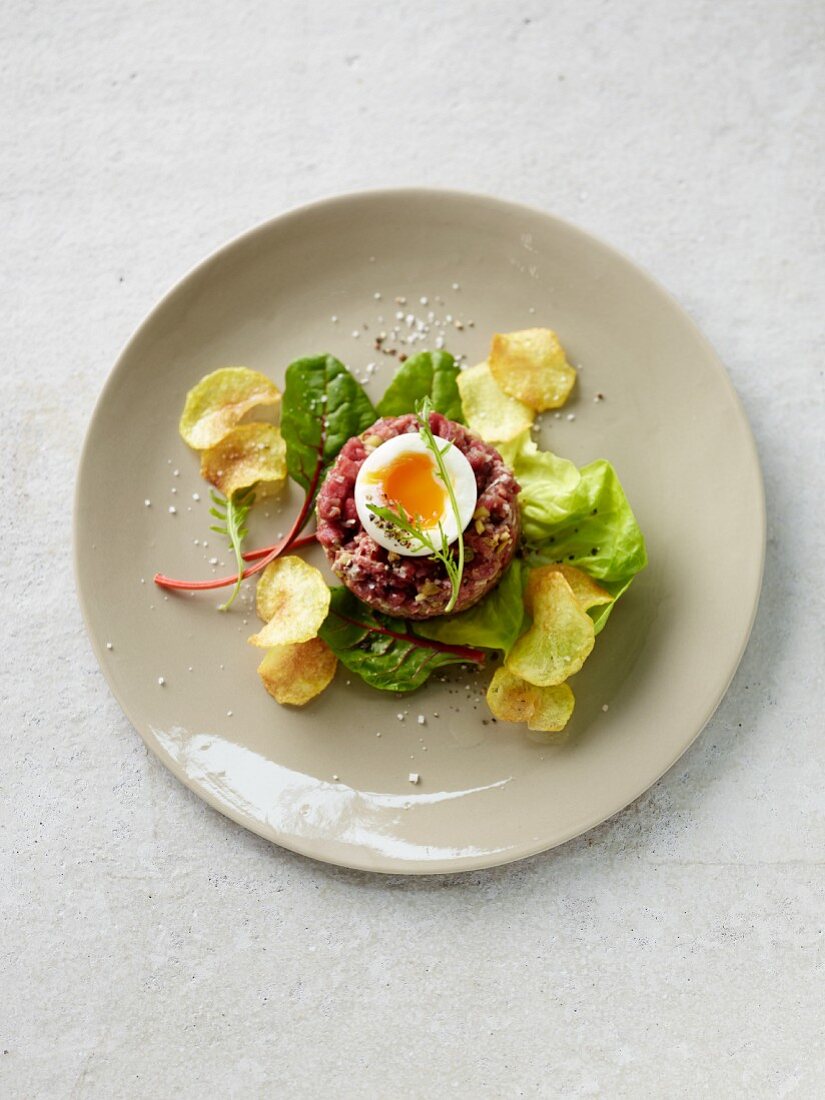 Beef tartare with egg and lettuce