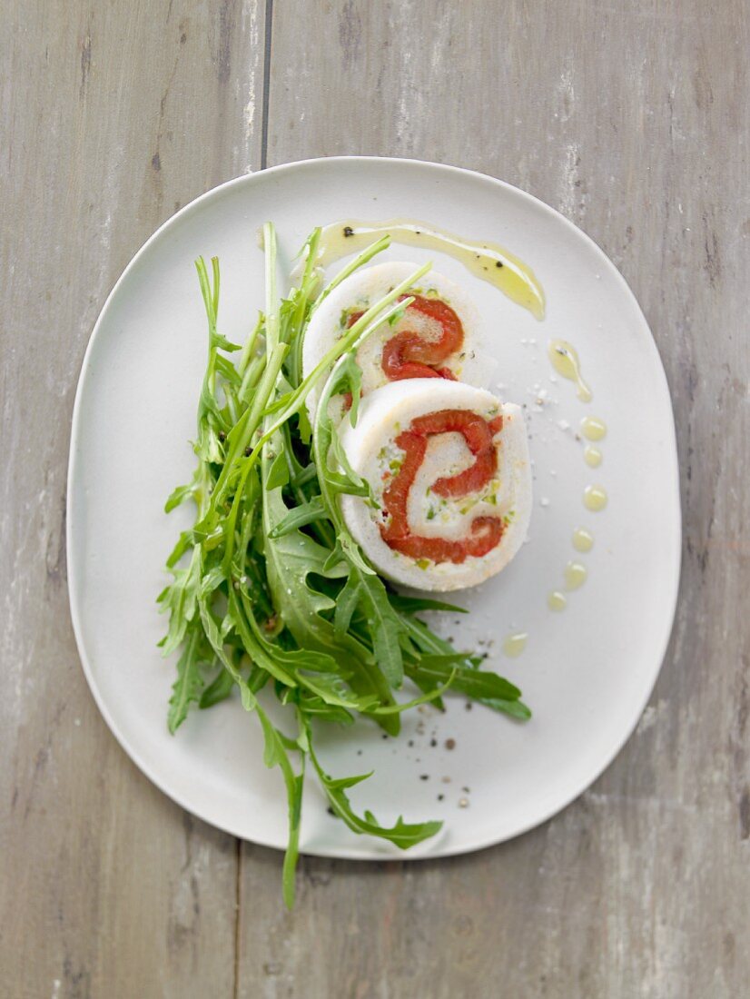 Rolled tramezzini with rocket salad