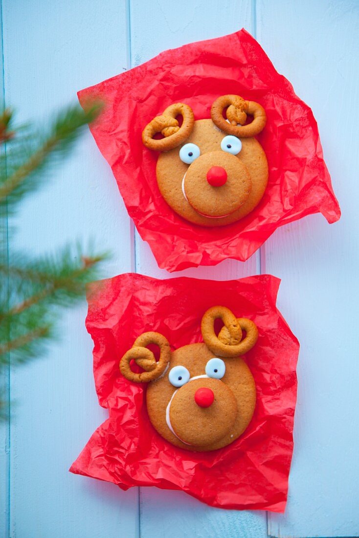 Two decorative gingerbread cookies look like a reindeers