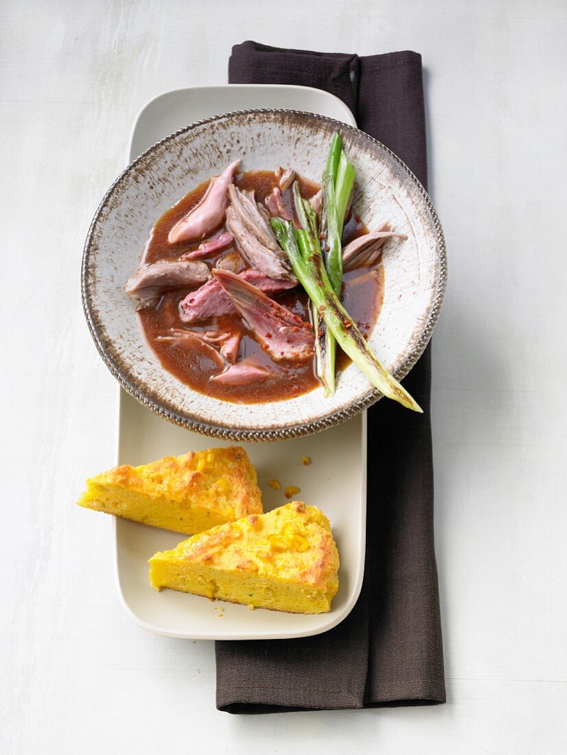 Pork in barbecue sauce with spicy polenta cake