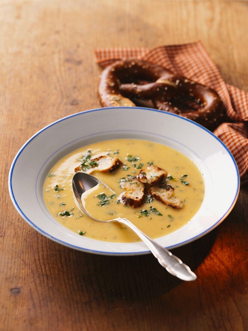 Cheese soup with soft prezels