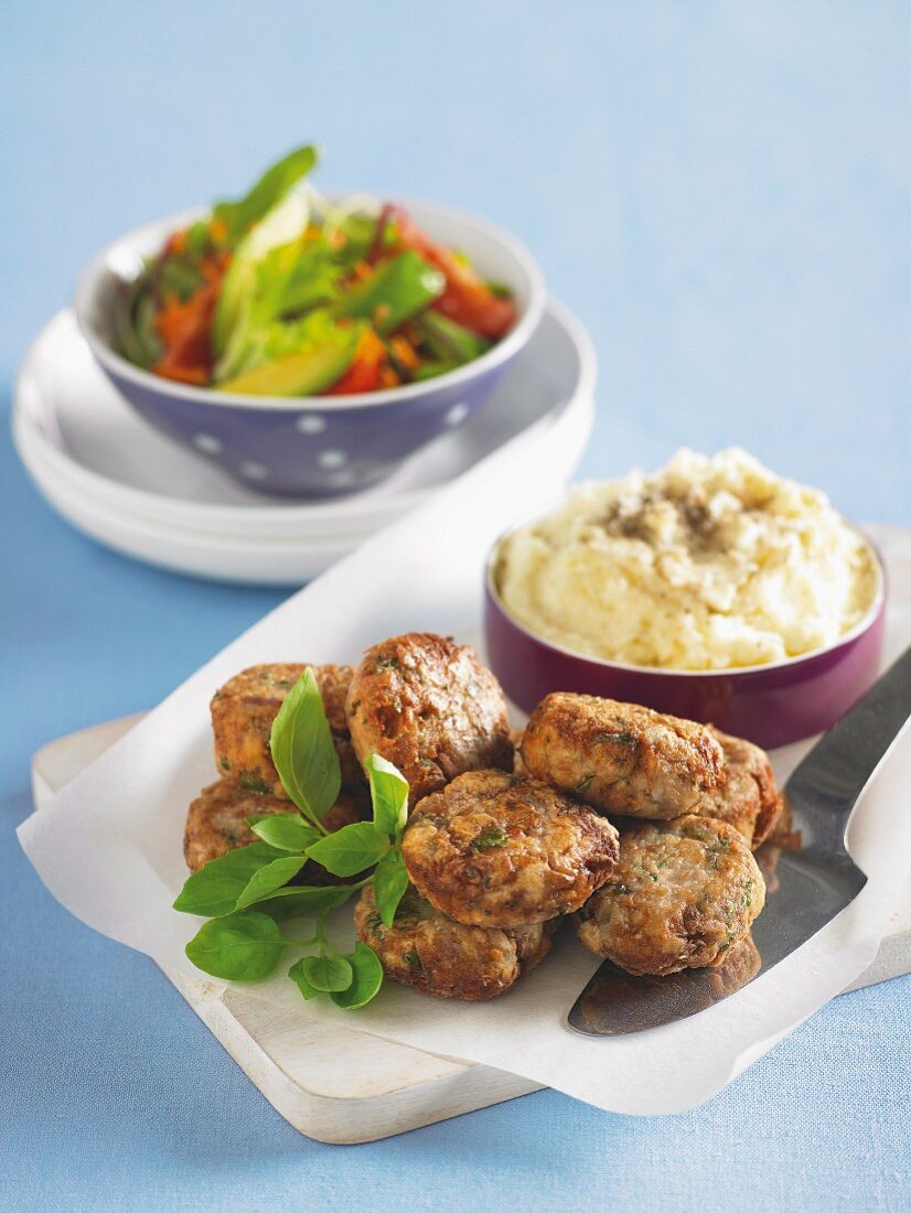 Fishcakes with tuna fish, mashed potatoes and salad