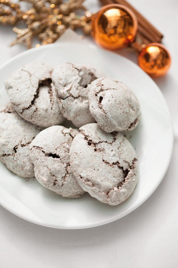 Chocolate macaroons on plate