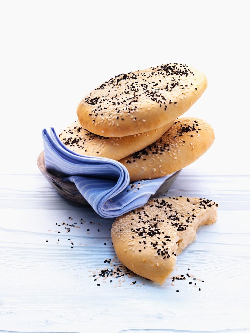 Pita breads with sesame seeds, stacked