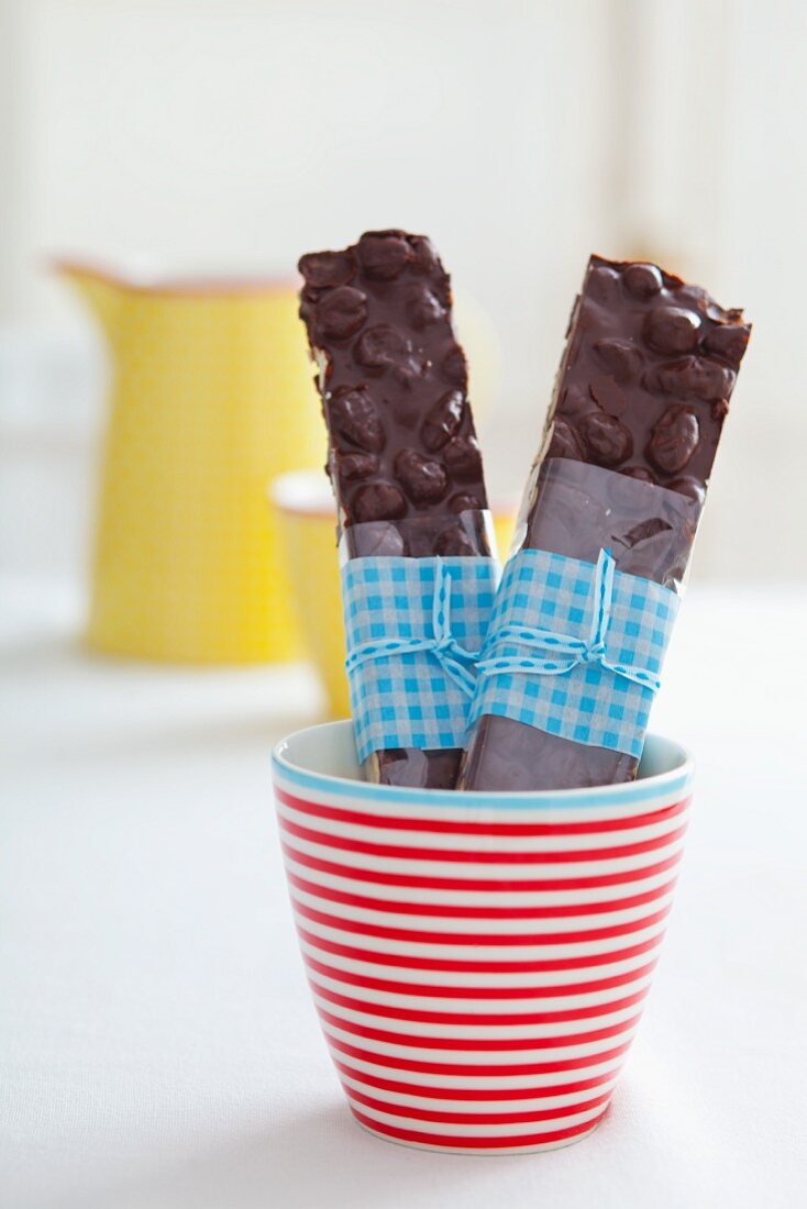 Home-made chocolate and nut bars in a cup