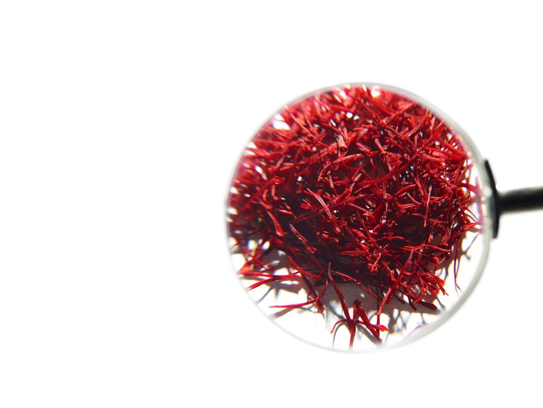 A view of saffron threads through a magnifying glass