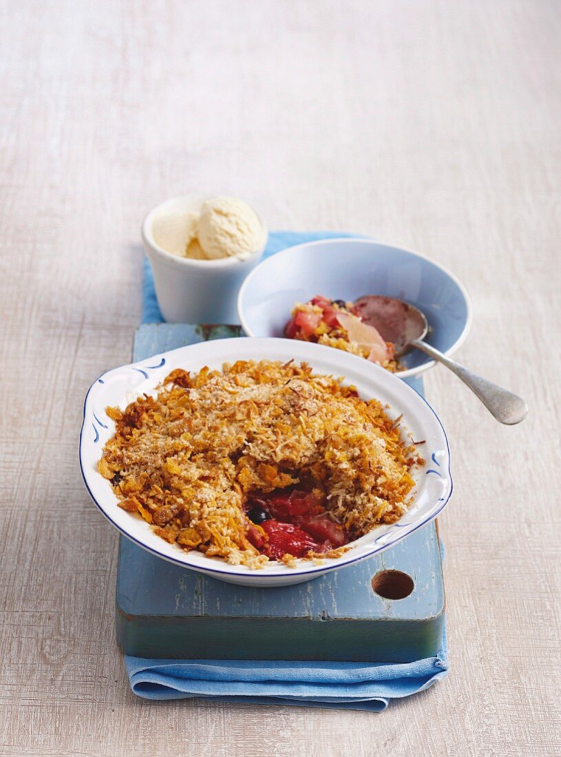 Apple and berry crumble with vanilla ice cream