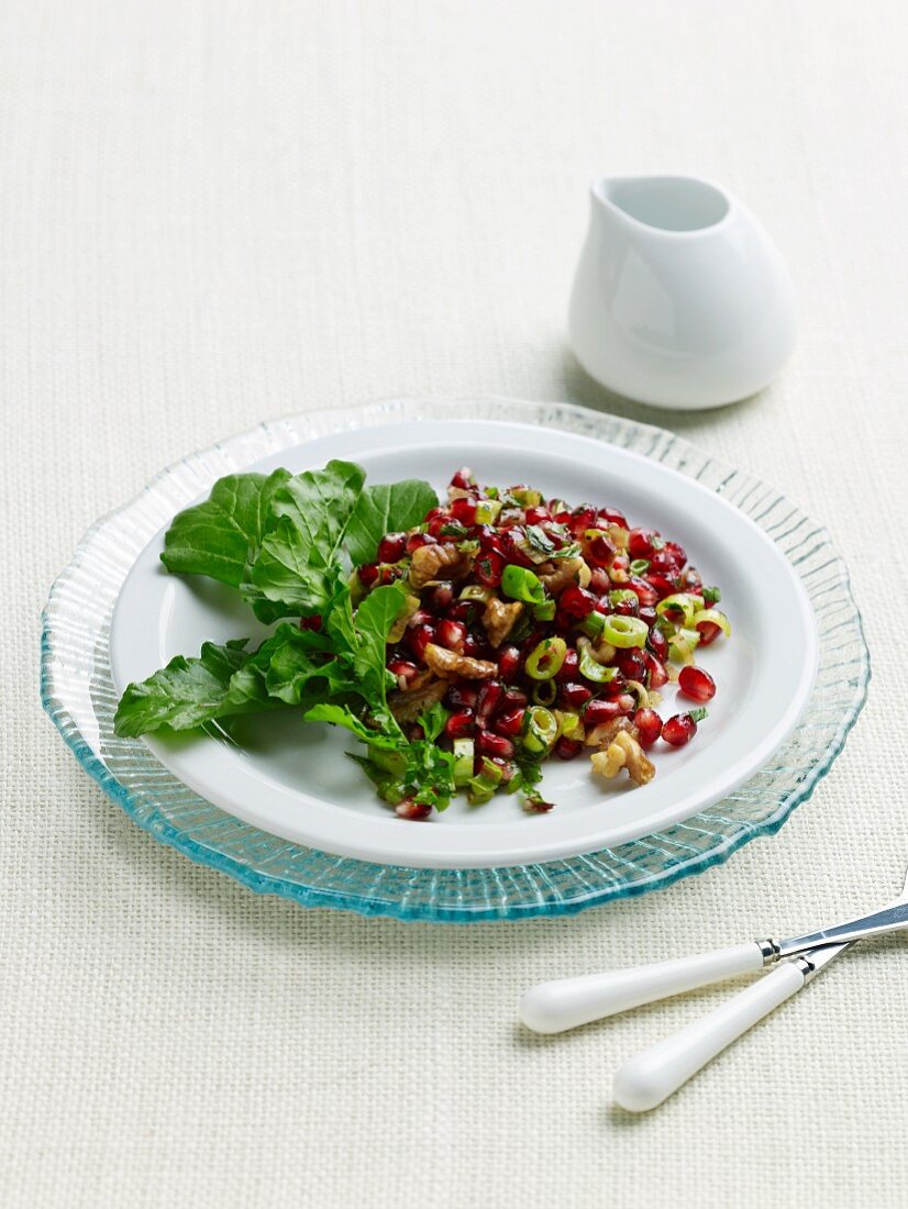 Pomegranate Salad with Chopped Walnuts, Minced Parsley and Greens