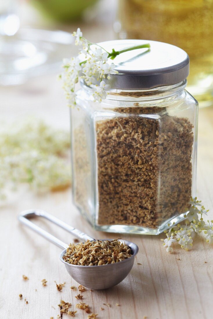 Dried elderflowers in a screw-top jar