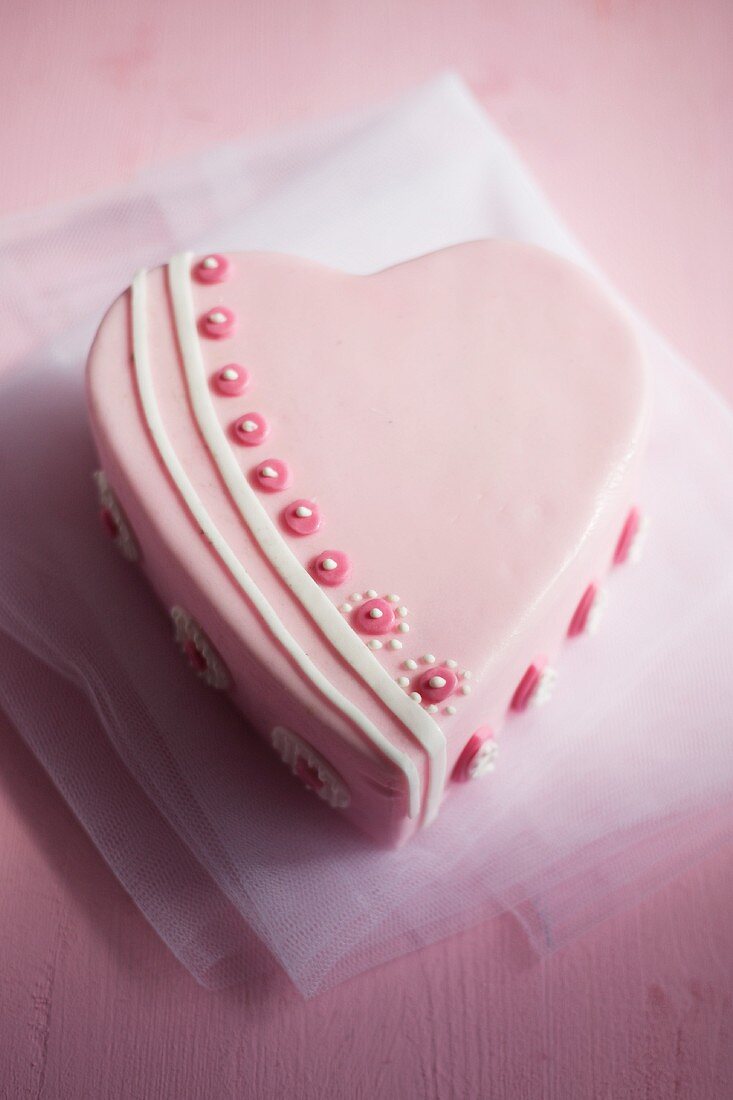 Pink heart-shaped cake