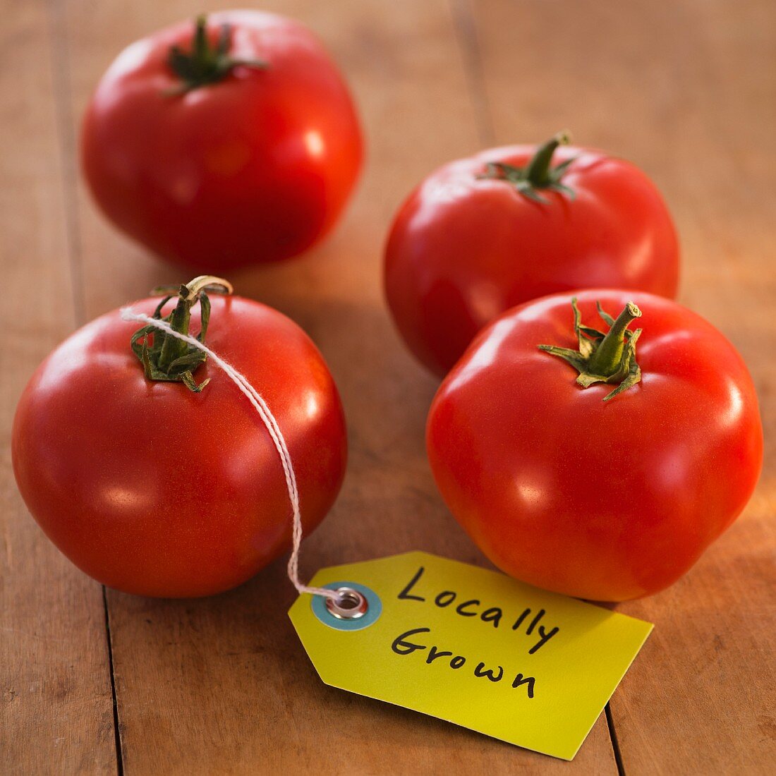 Locally grown tomatoes with label