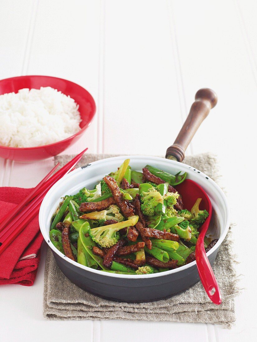 Beef strips with broccoli, served with rice