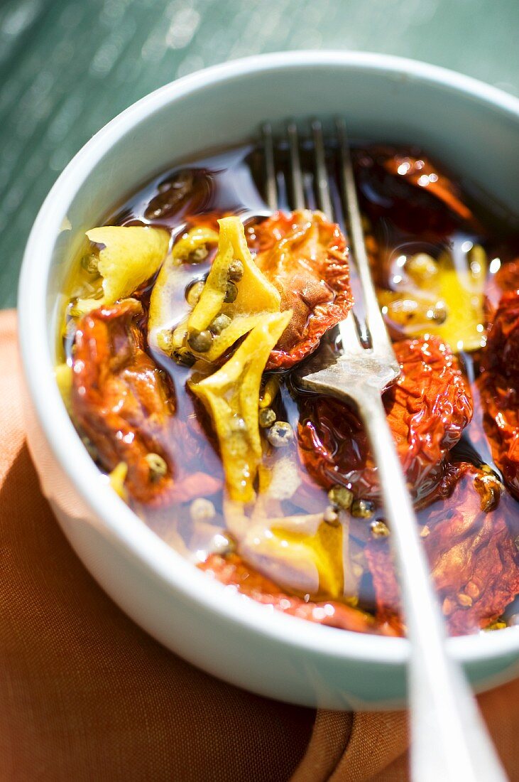 Preserved sundried tomatoes in a small bowl