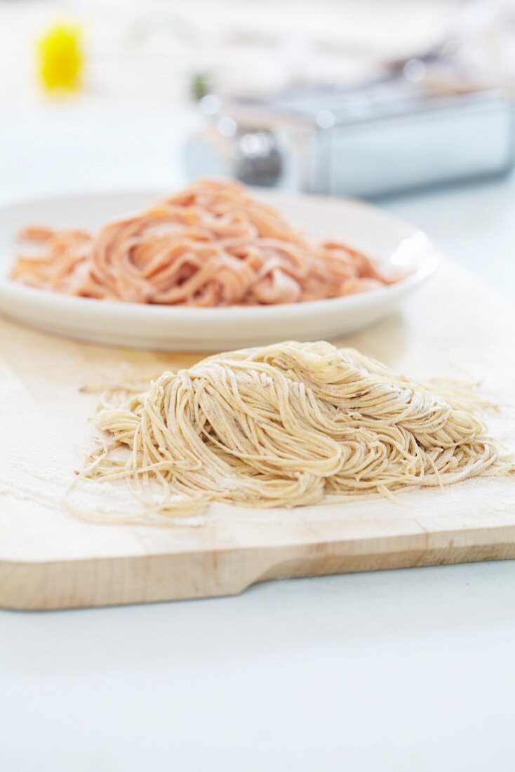 Fresh home-made pasta: tomato pasta and olive pasta