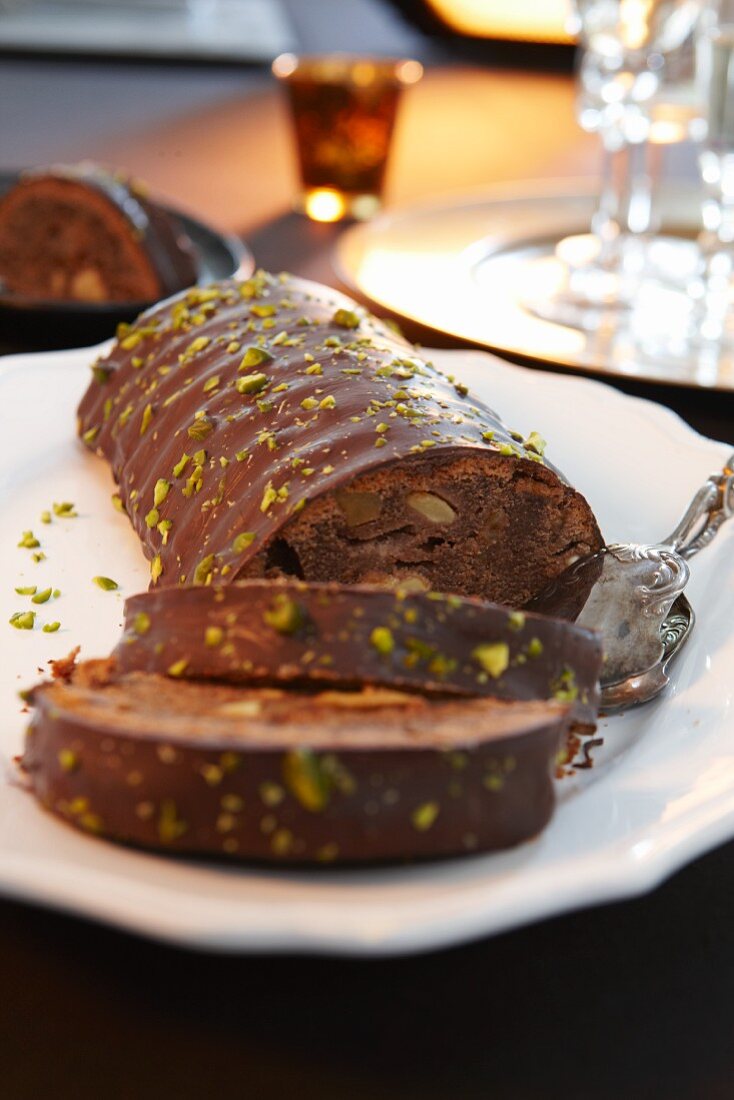 Rehrücken (cake designed to look like a saddle of venison) with pistachios, partly sliced