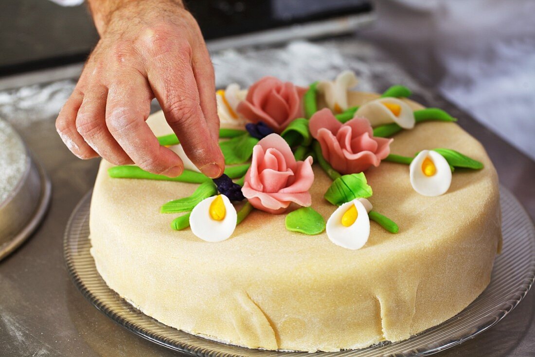 Wedding Cake with Marzipan Flower Icing Decorations Stock Photo | Adobe  Stock