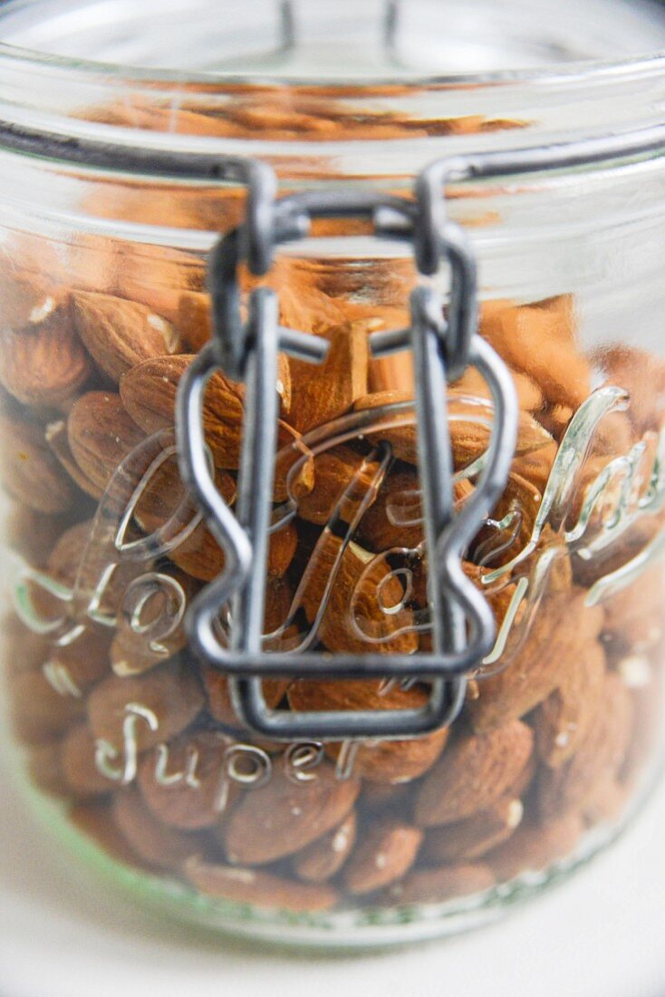 Lots of almonds in a storage jar