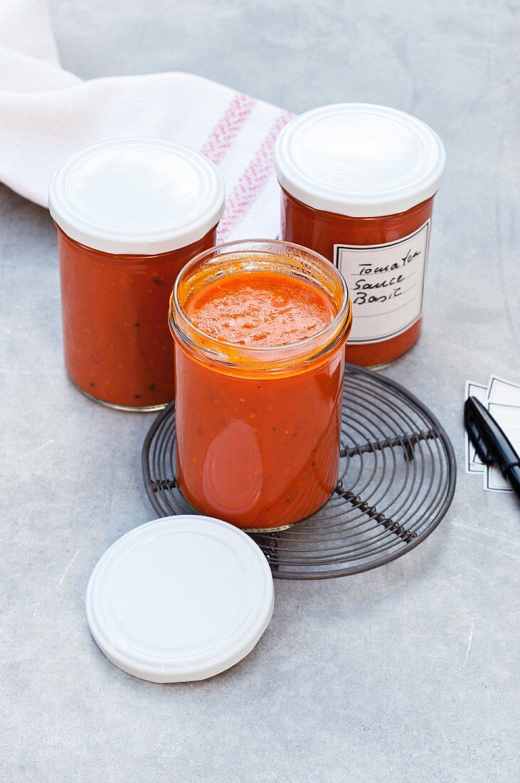 Homemade tomato sauce in preserving jars