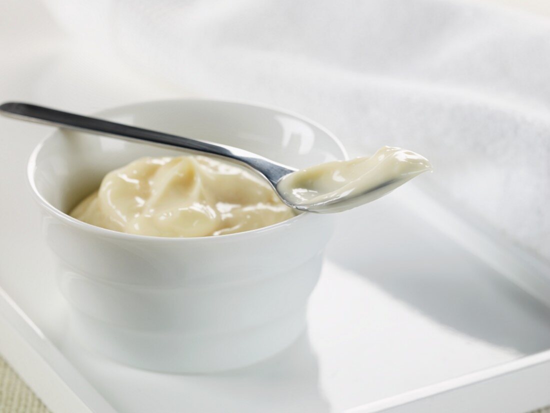 Bowl and Spoon of Mayonnaise