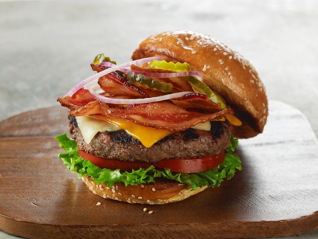A cheeseburger with bacon