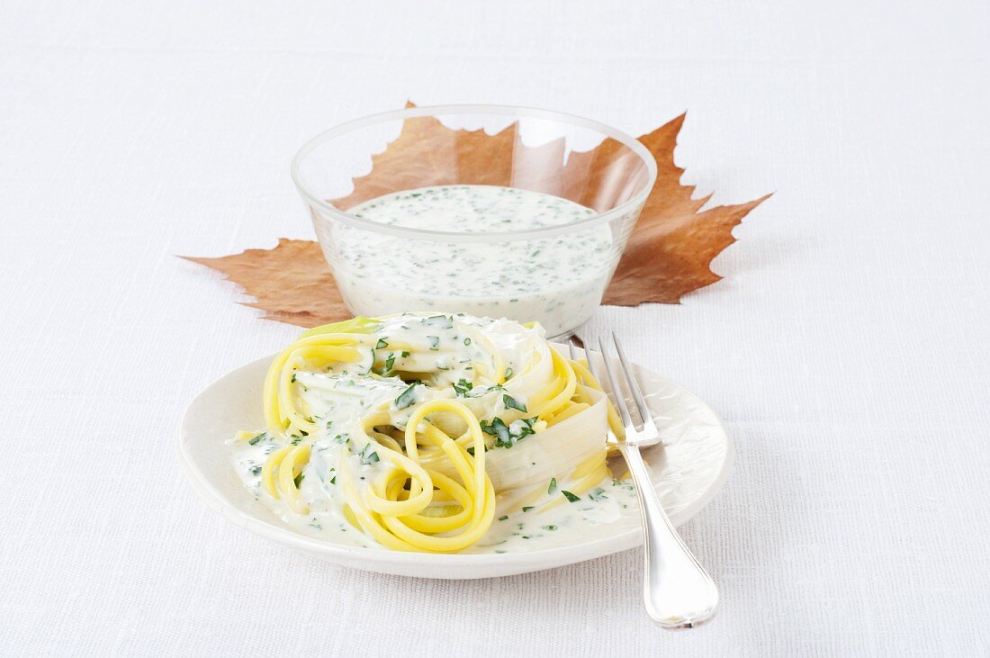 Linguine with cheese sauce and herbs