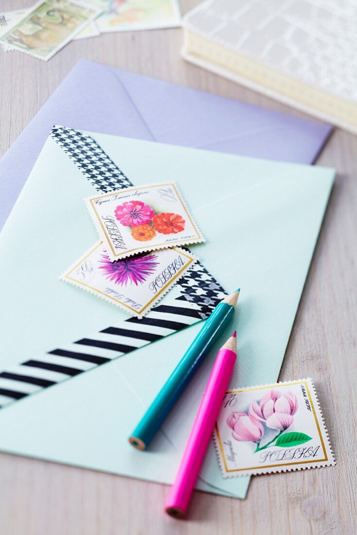 Pens, decorated envelopes & decorative postage stamps