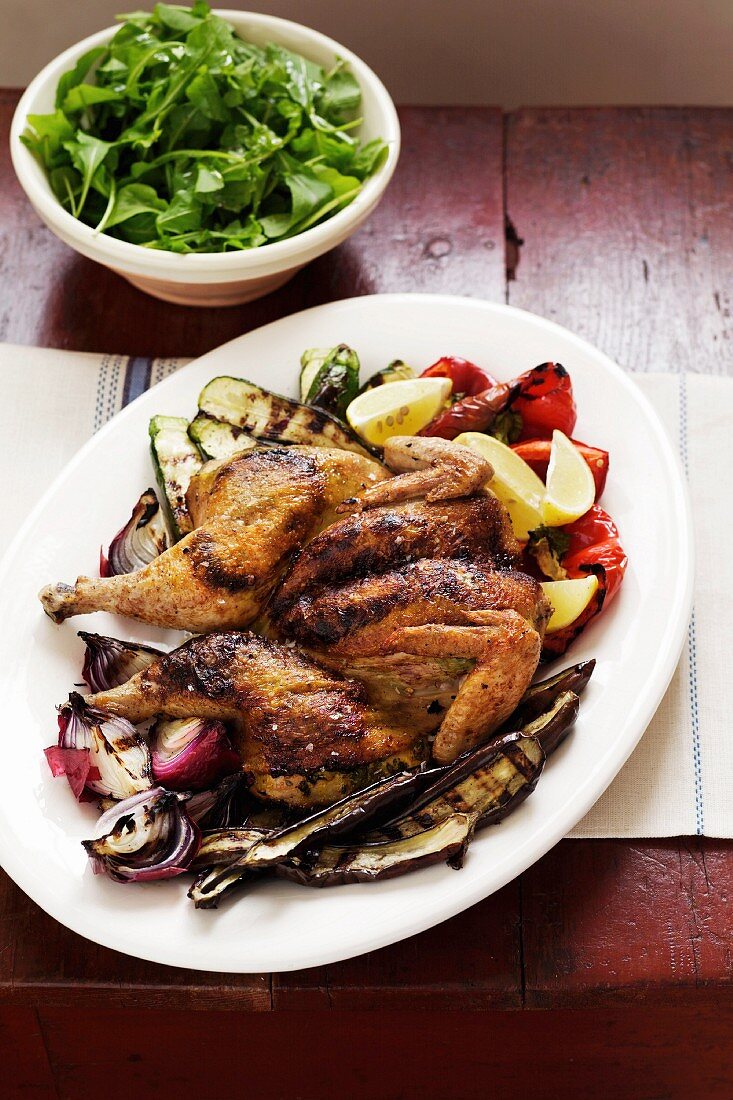 Butterflied Roast Lemon Chicken - Roast Rd Onions, Zucchini, Red Peppers, Lemon, Rocket Salad