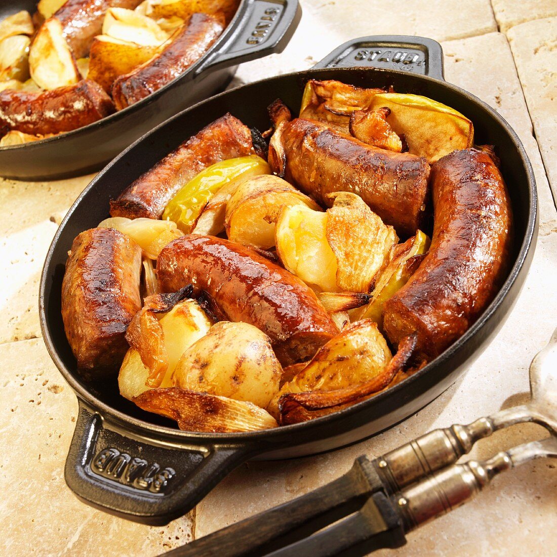 Swiss Pork Sausage, Apples and Onions Roasted in a Cast Iron Pan