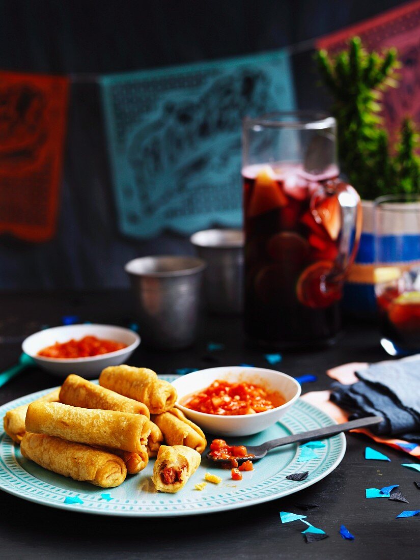 Potato taquitos with salsa roja (vegan)