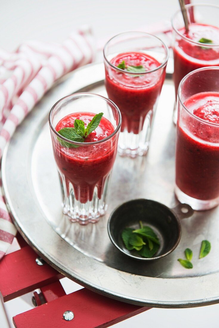 Raspberry smoothie with mint leaves