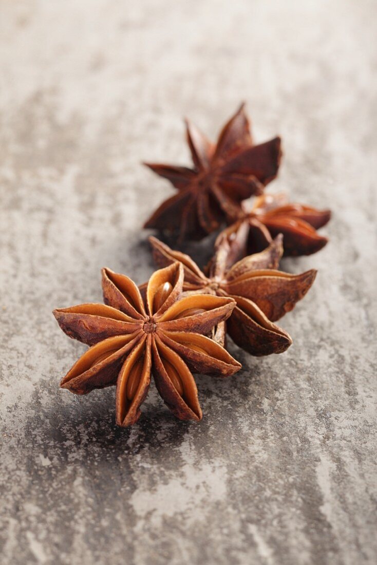 Star anise on a grey surface