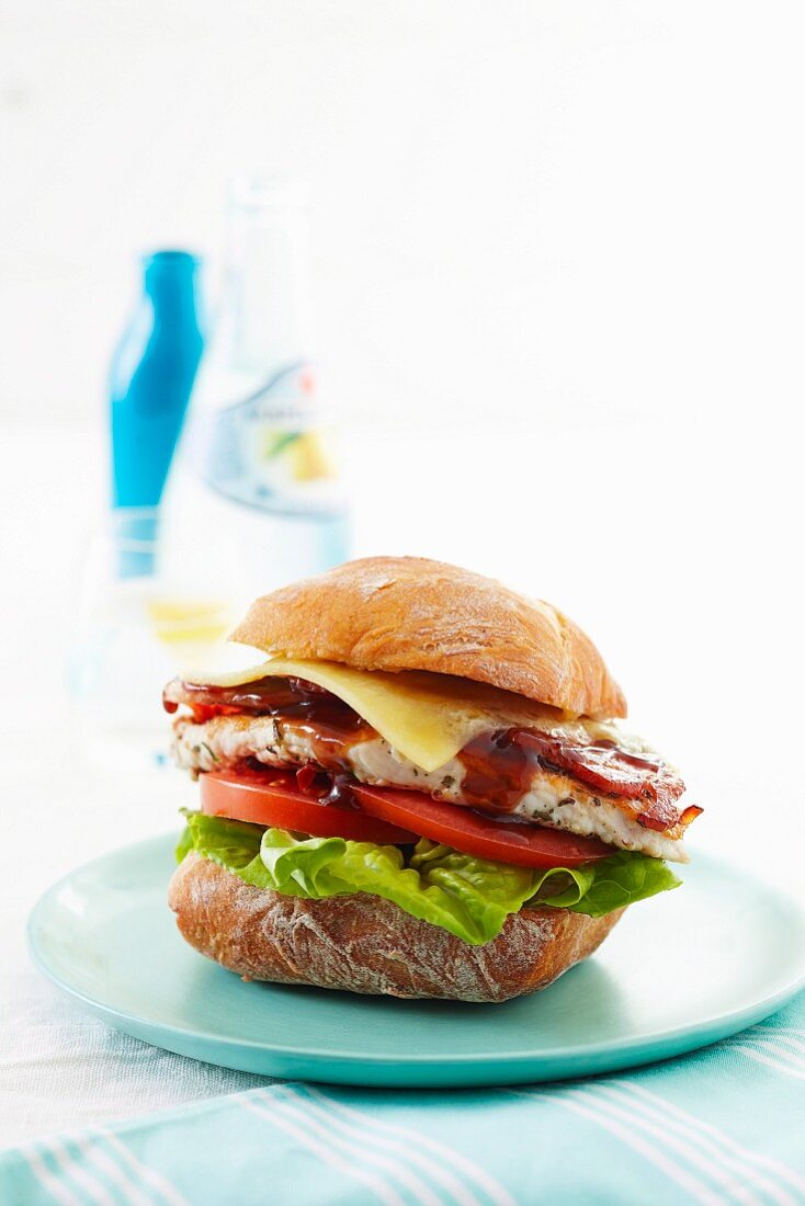 Turkey burger with bacon and barbecue sauce